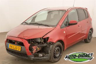 uszkodzony samochody osobowe Mitsubishi Colt 1.3 Airco Intro Edition 2010/4